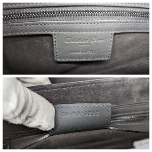 Christian Ultra Matte Black Calfskin Saddle Bag