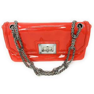 Mademoiselle patent leather clutch bag