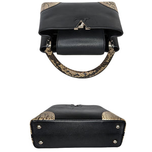 Capucines python handbag