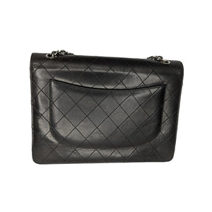 CHANEL Beige Lambskin Leather Vintage Flap Backpack - The Purse Ladies